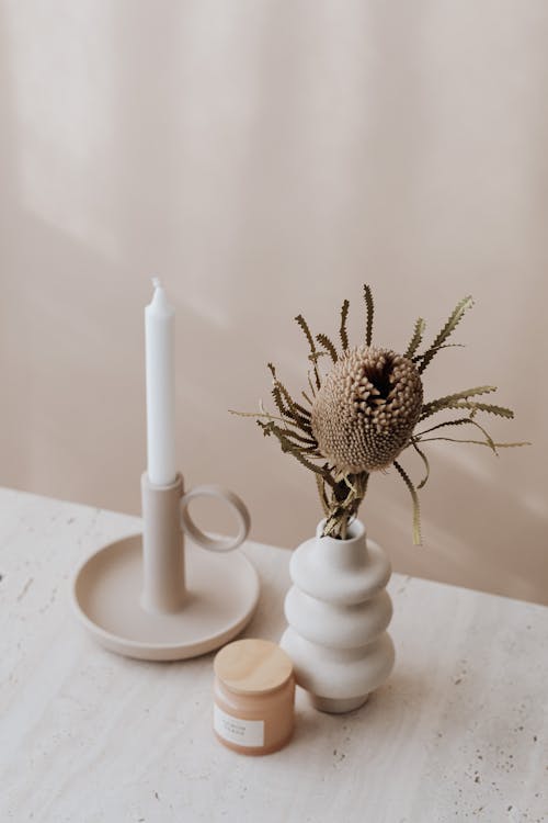 Photo of a Candle and Vase 