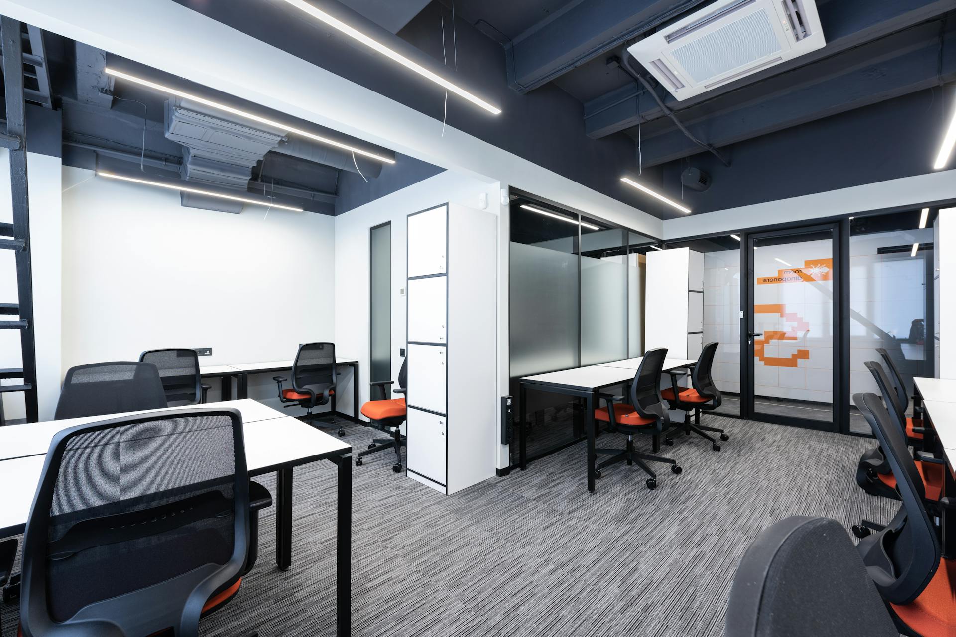 Open space office with tables and chairs