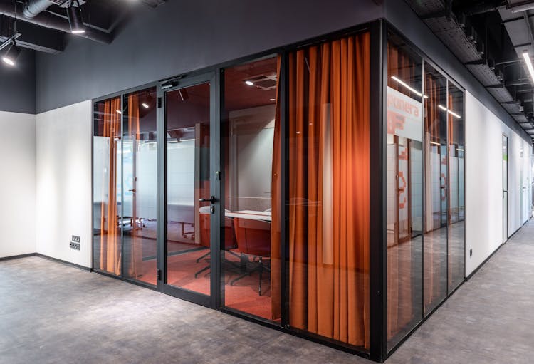 Corridor In Office With Glass Walls Of Conference Room