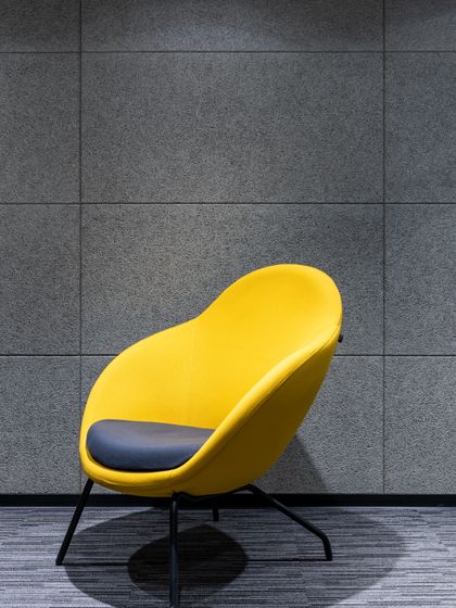 Sunlit interior with a low armchair, used as the cover image of the Funding Raise Deck layout — photo by Max Vakhtbovych on Pexels
