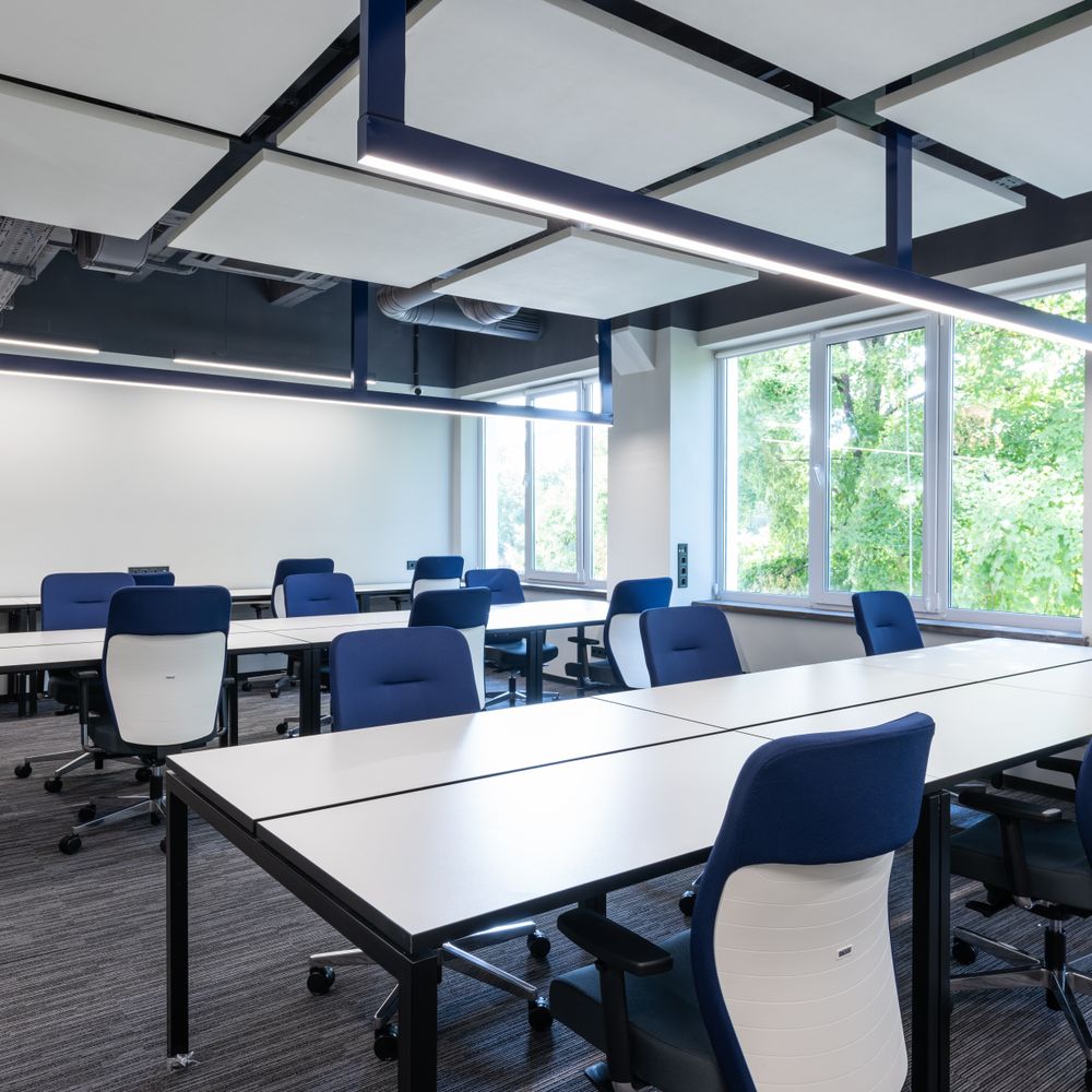 Caton — office relocation team moving desks and equipment