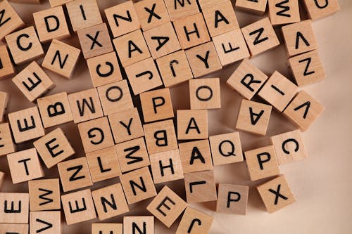 Close-Up Photo of Wooden Blocks with Letters