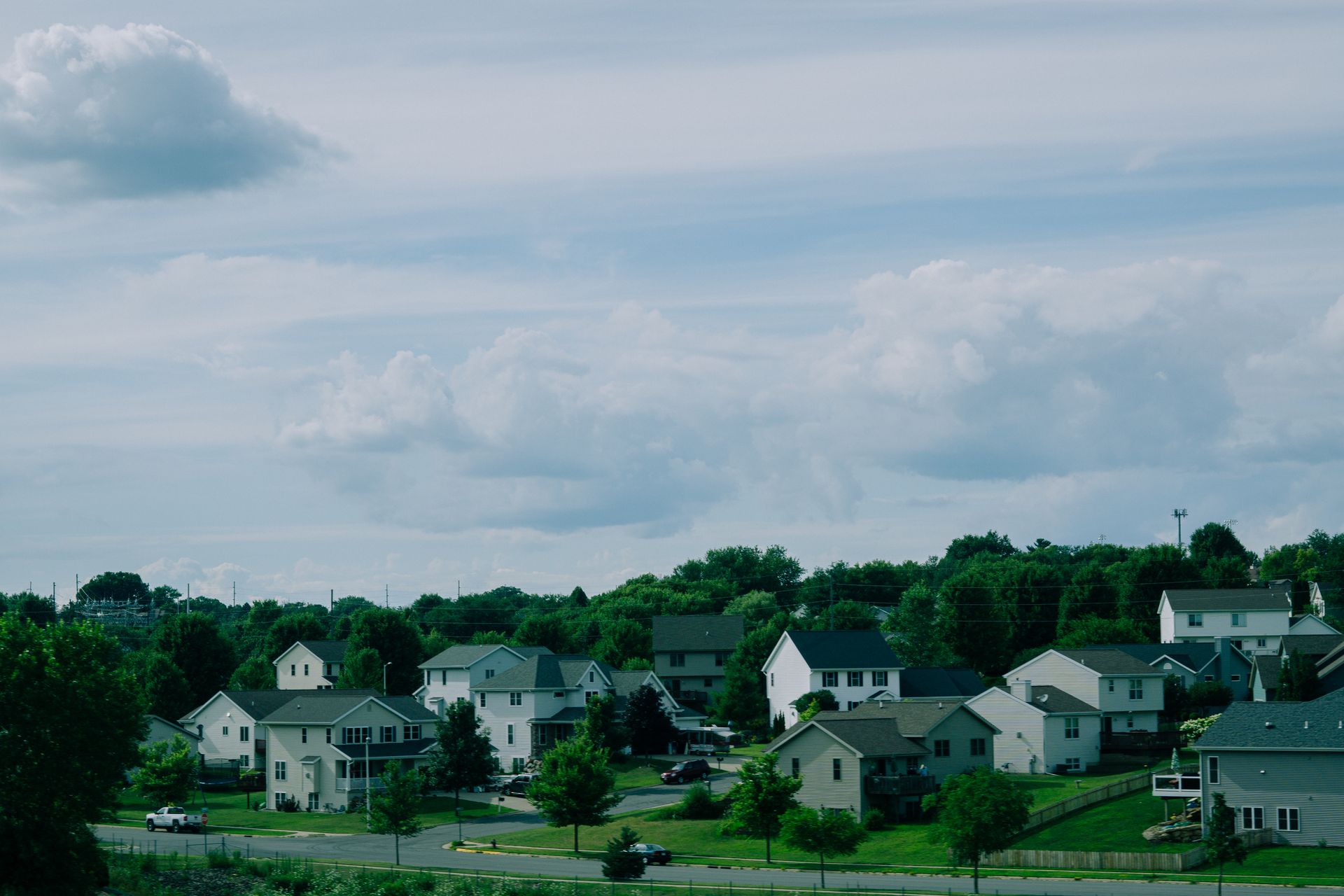 Midwest suburban housing neighborhood — affordable housing market frame for two-speed Midw