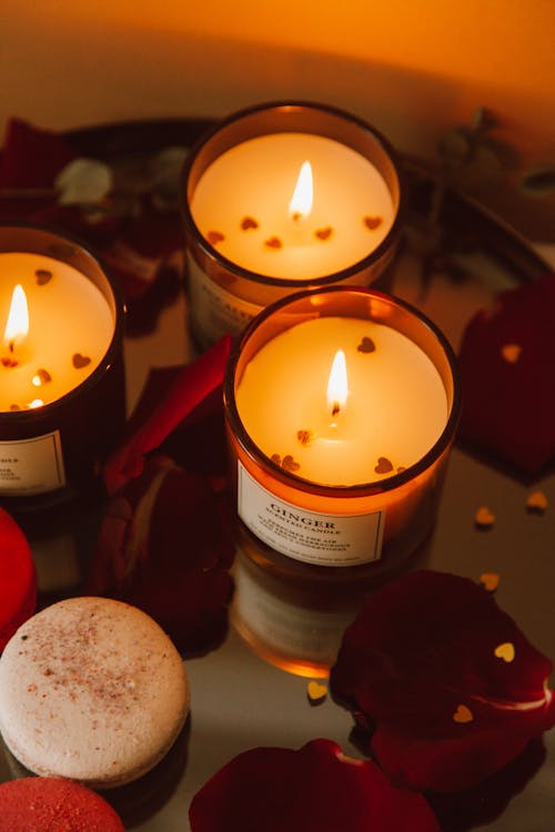 A Lighted Candles on a Glass Holders