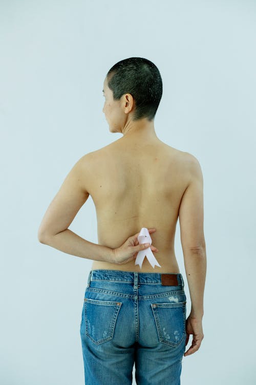 Female Backside, White Background. Stock Photo, Picture and