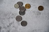 Russian Coins over a Concrete Pavement