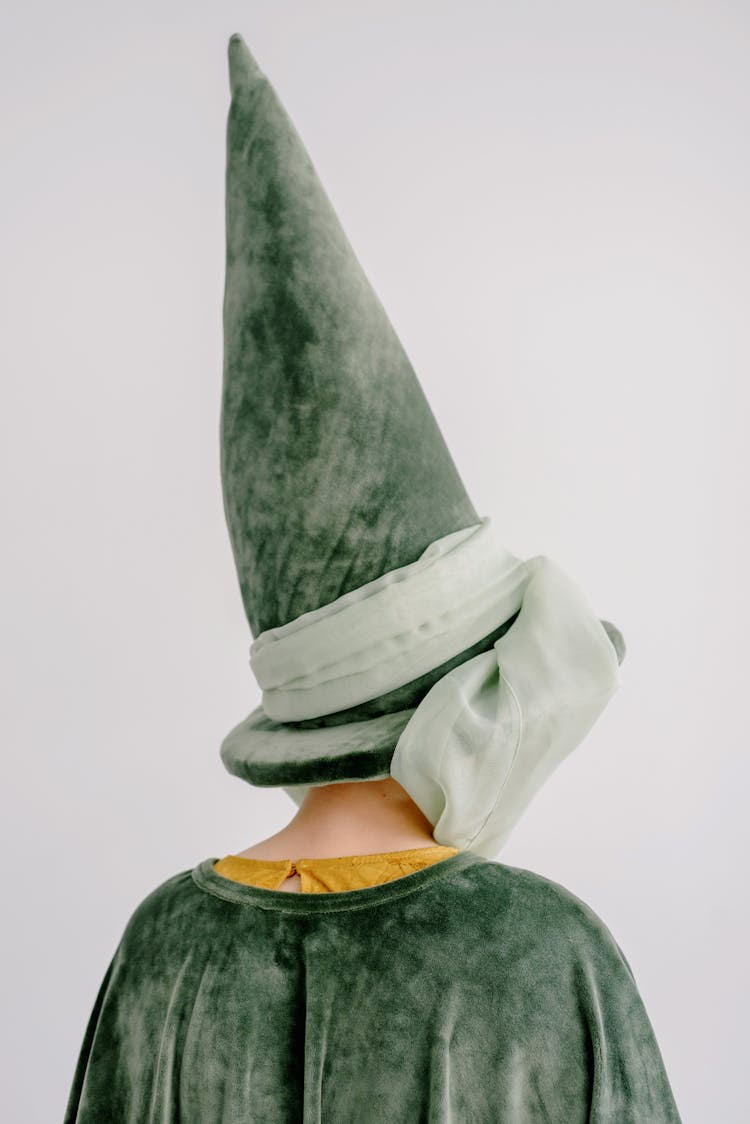 Child Wearing A Green Fairy Hat