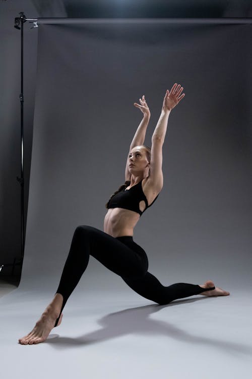 A Woman Doing Sanchalanasana