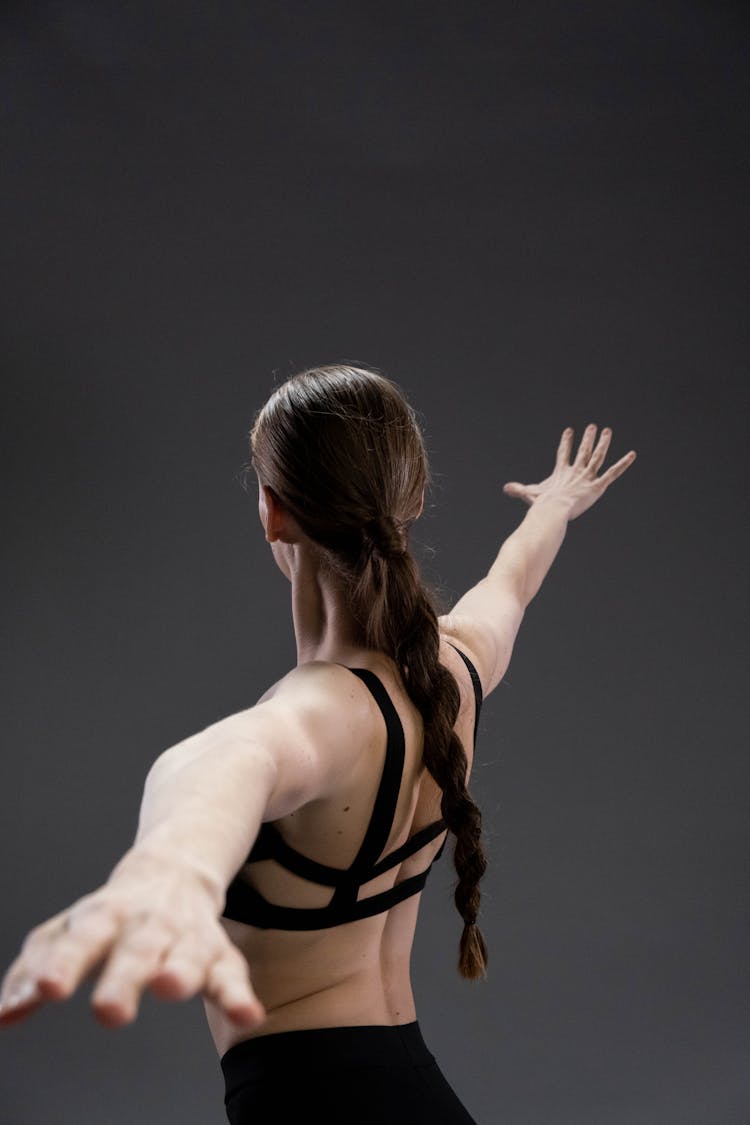 A Woman Doing A Warrior Pose 