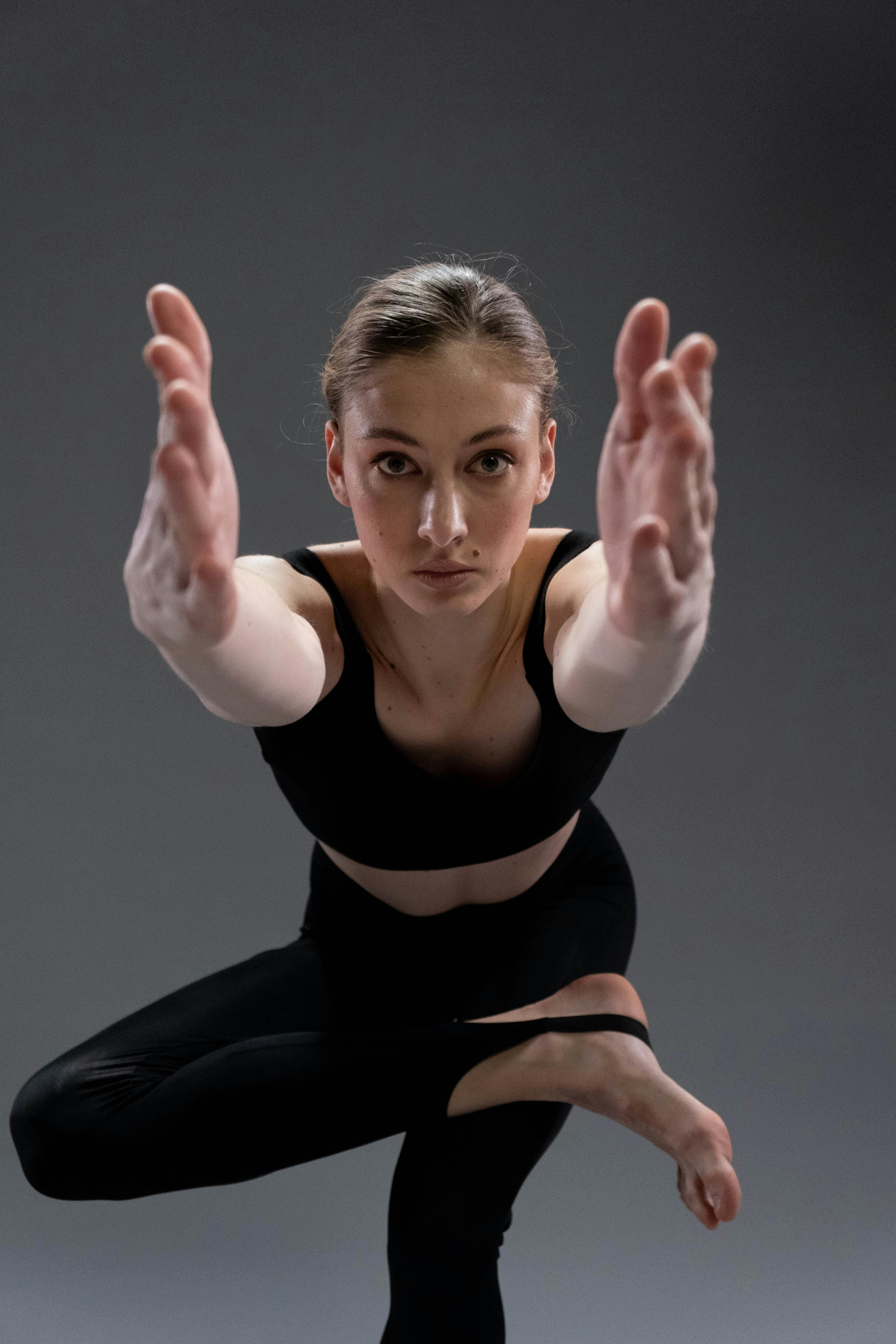 Raised female hand against wall · Free Stock Photo