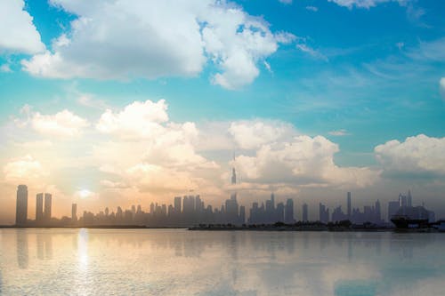 Silhouette of Buildings under Blue Sky