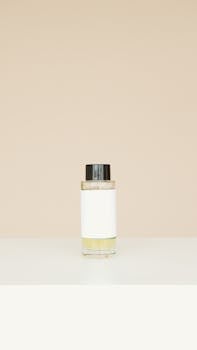 A sleek glass bottle with a label, ideal for branding or product mockup.