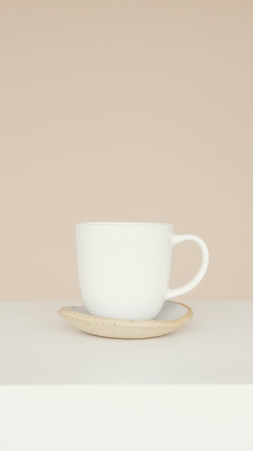 A White Cup on a Saucer