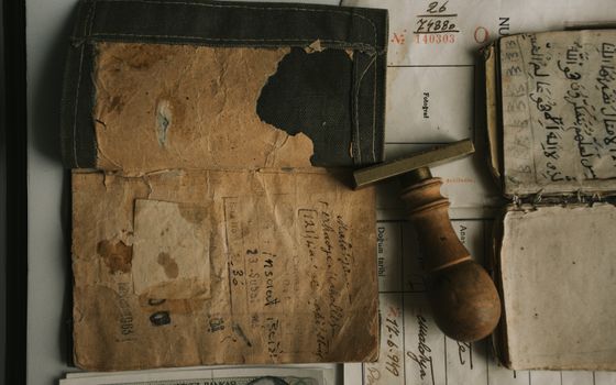 Ancient Documents and Stamp on Table