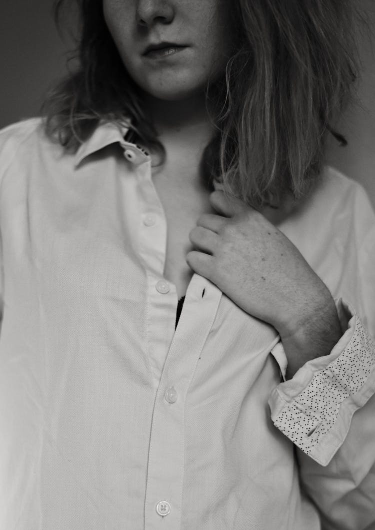 Close-up Of Woman In Simple Shirt