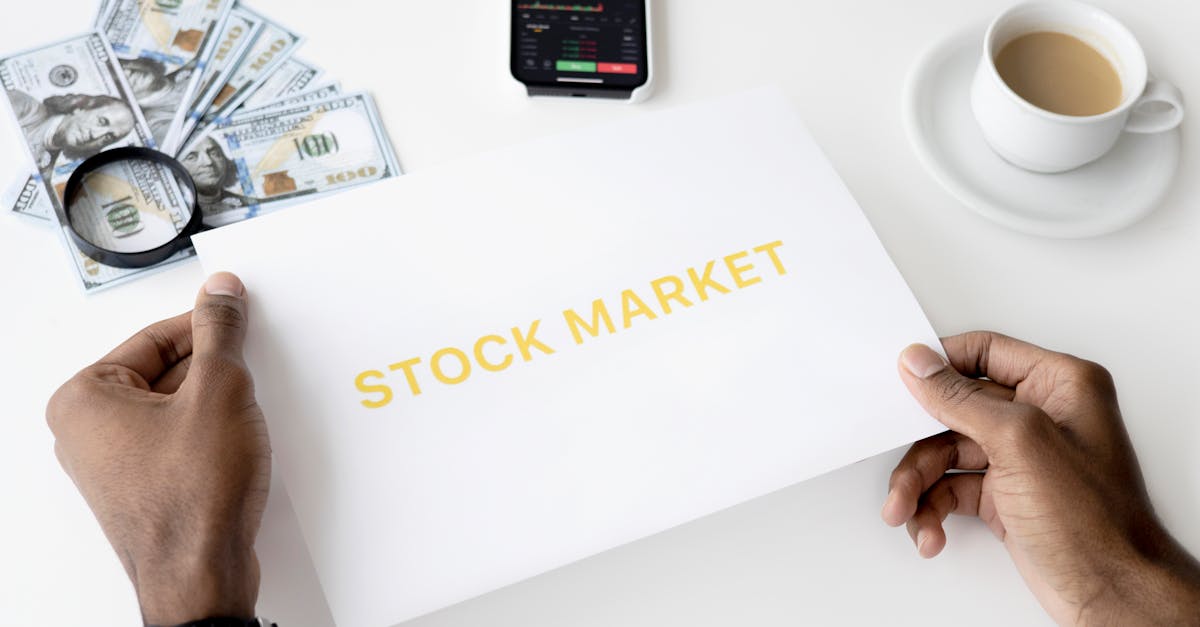 Business theme with stock market document, currency, and mobile display.
