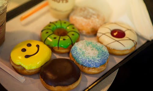 Free Shallow Focus Photography of Assorted Flavored Donuts Stock Photo