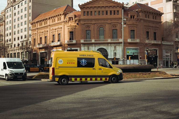 Yellow Ambulance On The Road