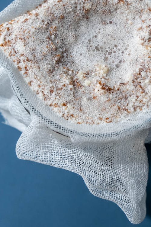 Crushed Foamy Food on a Cheesecloth