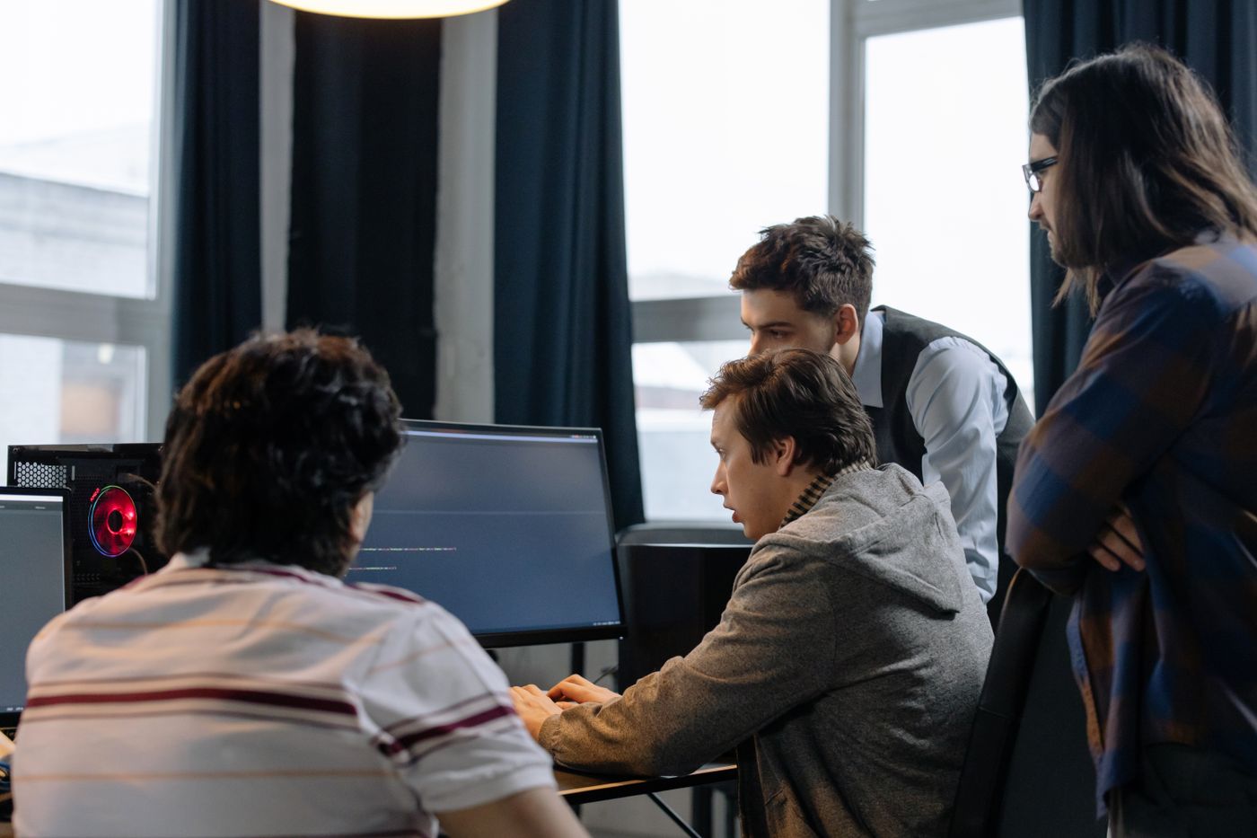 Finance team reviewing monthly lender covenant metrics