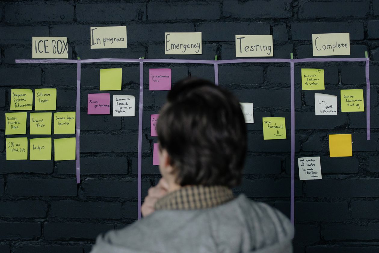 Man reviewing a scrum task board