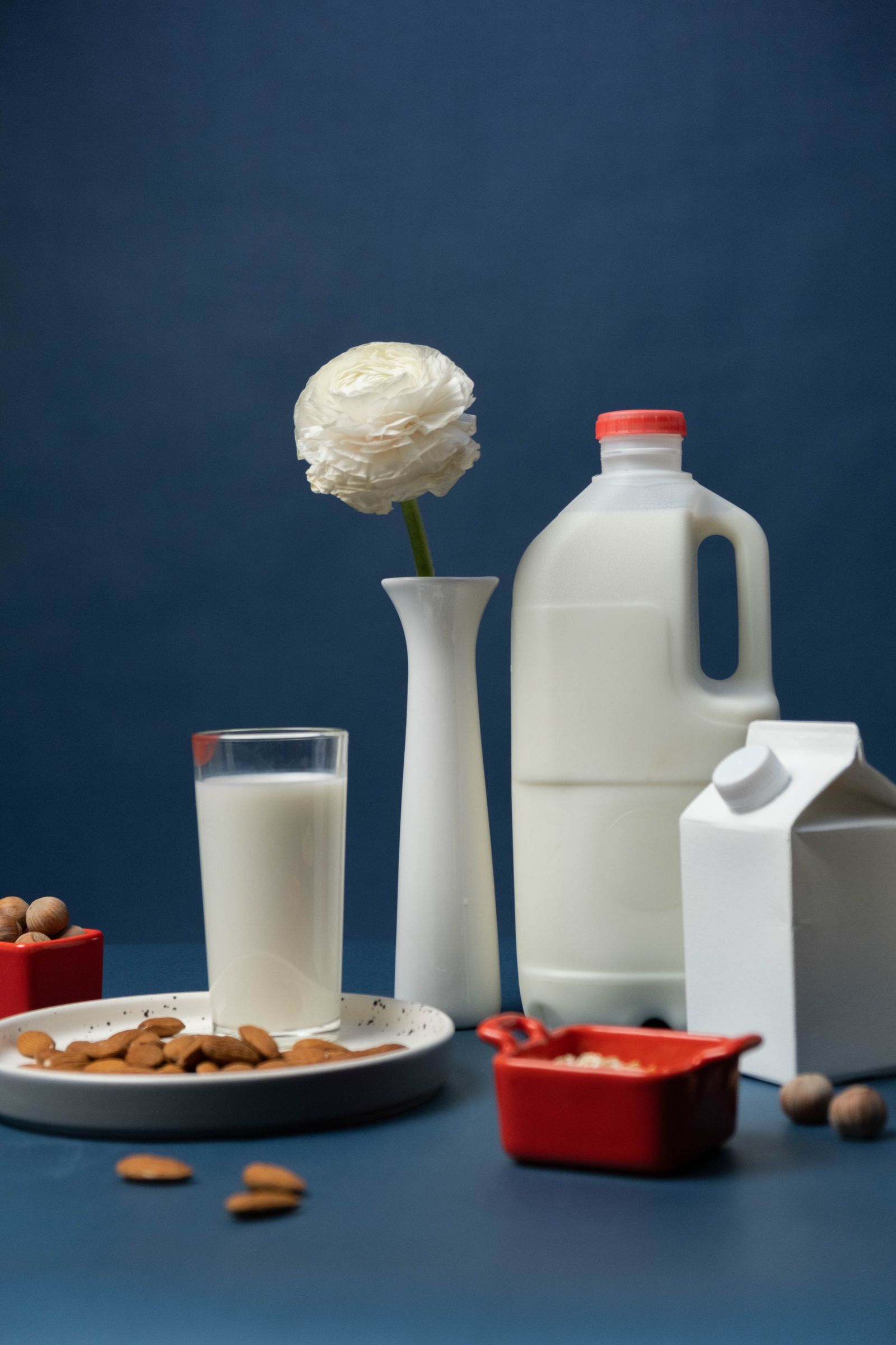 Bottles and a glass of plant milk