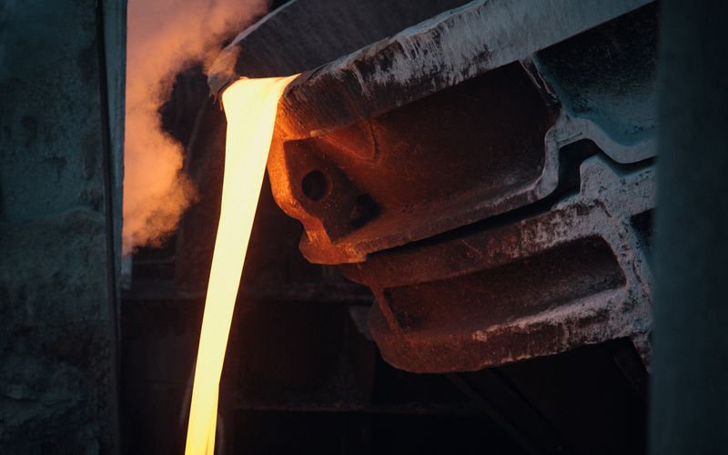 Molten metal being poured in a foundry