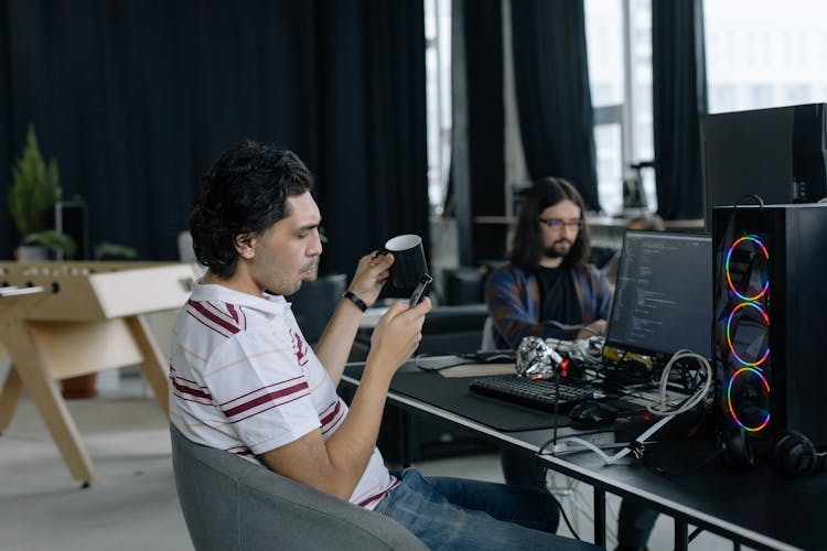 Men Working With Computers