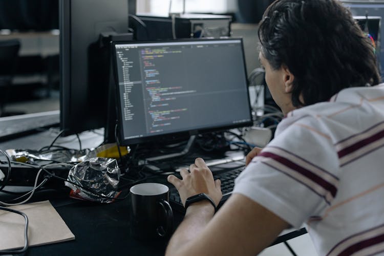 A Man Using Computer