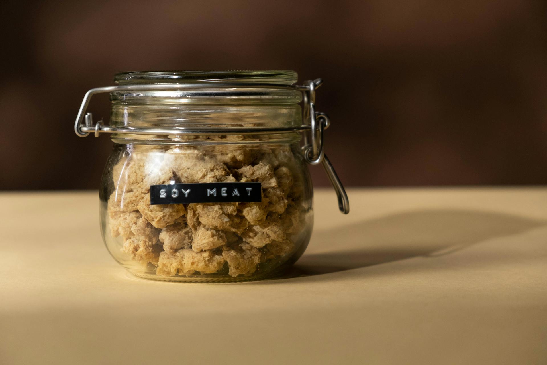 Close-Up Shot of a Jar of Soy Meat