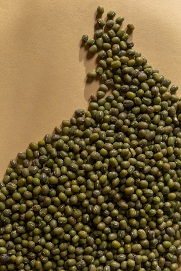 Mung Beans On A Yellow Surface