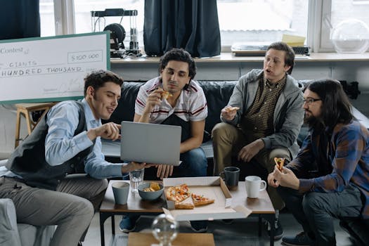 A group of young adults discussing a $100,000 cash prize win in a modern office setting.