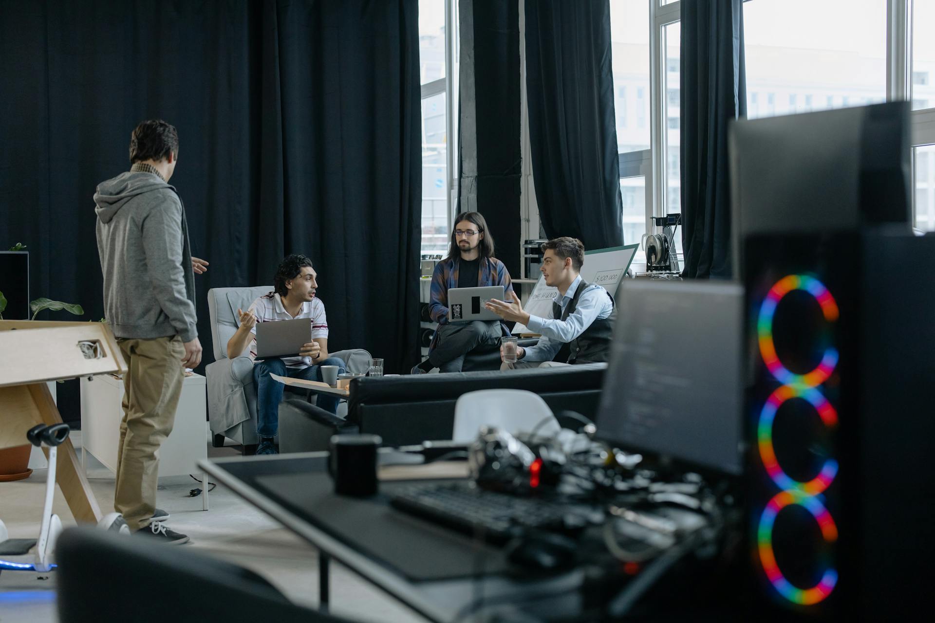 Employees of a Startup Software Company Talking During a Break