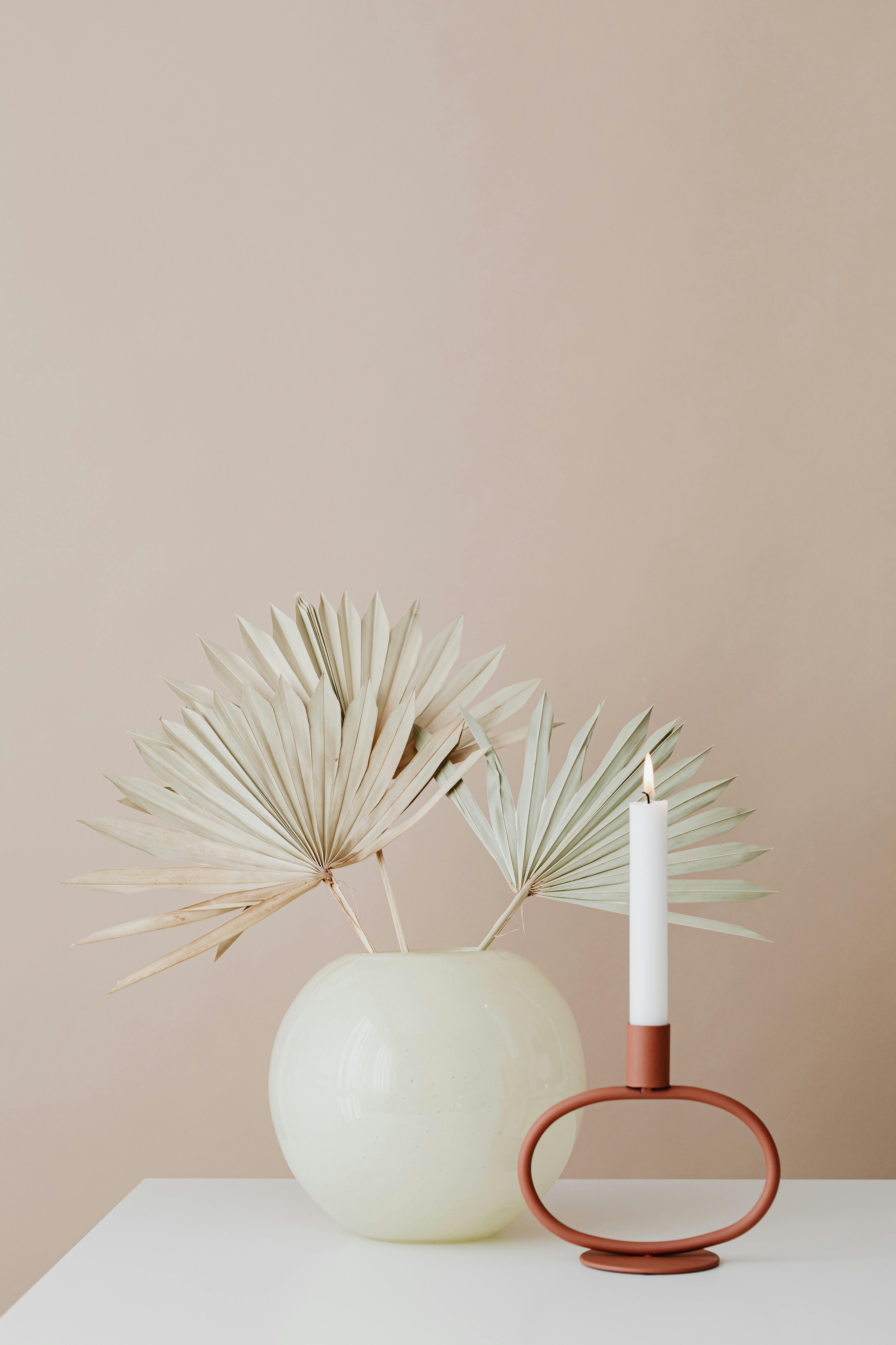 candle and vase in minimalist interior design