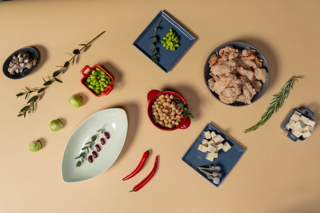 Flat lay of plant proteins, herbs and spices — photo by cottonbro studio on Pexels