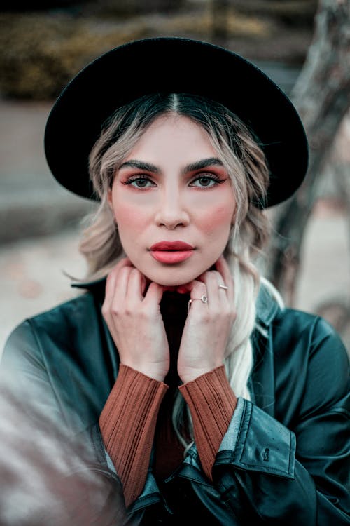 Woman Wearing Leather Jacket With Black Hat