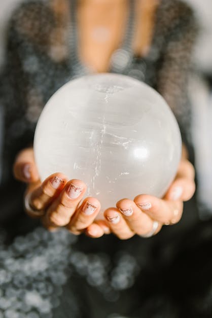 Person Holding White Round Ball · Free Stock Photo