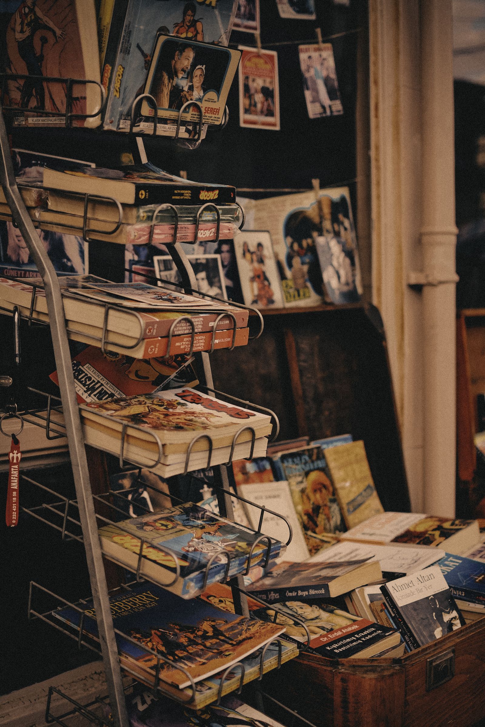 Hands browsing through boxed comics