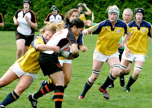 Intense women's rugby match showcasing athleticism and teamwork.