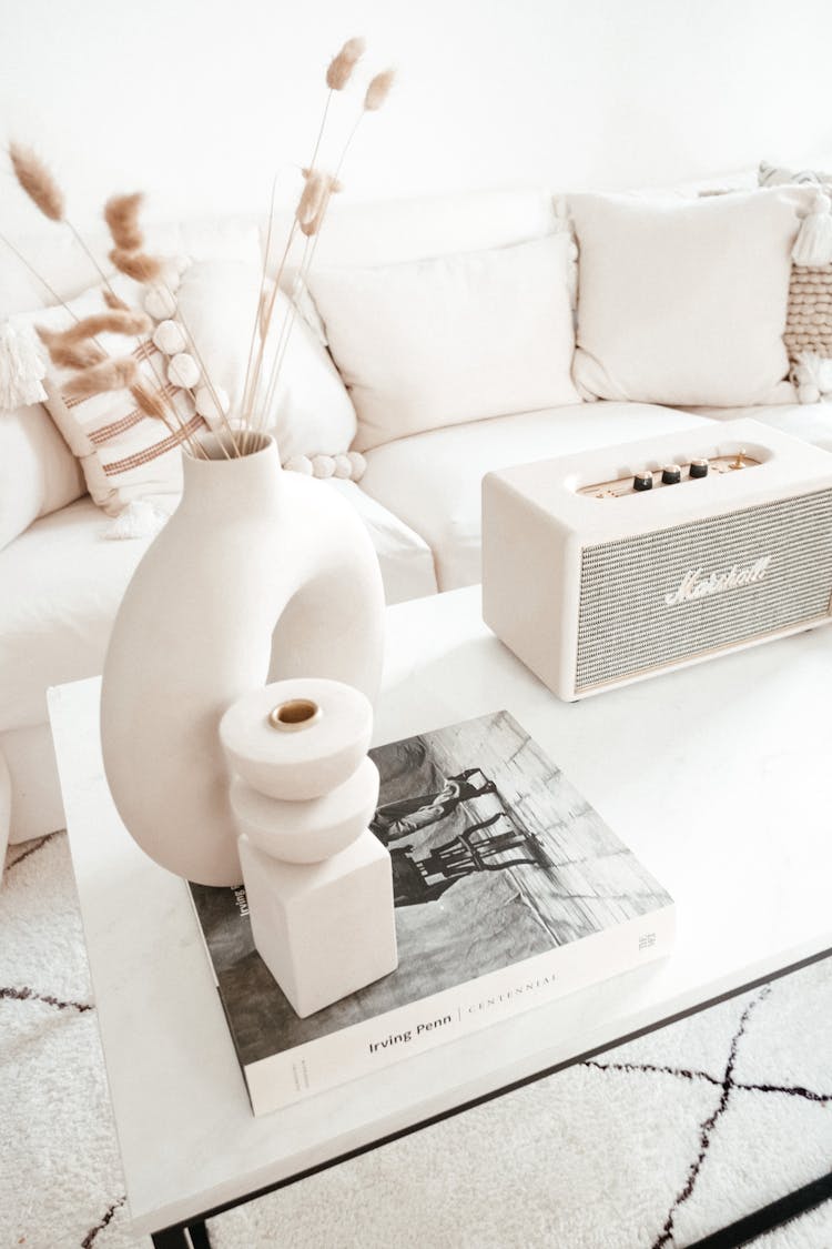 Table With Vase And Bluetooth Speaker