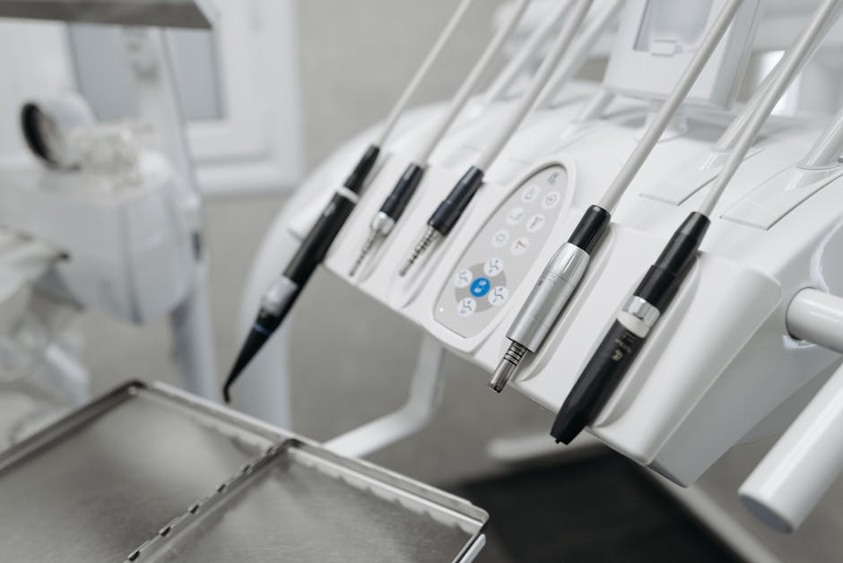 Advanced dental technology like a CEREC machine or 3D scanner in a modern dental office - Dentist Jackson Street Advanced dental technology like a CEREC machine or 3D scanner in a modern dental office - Dentist Jackson Street