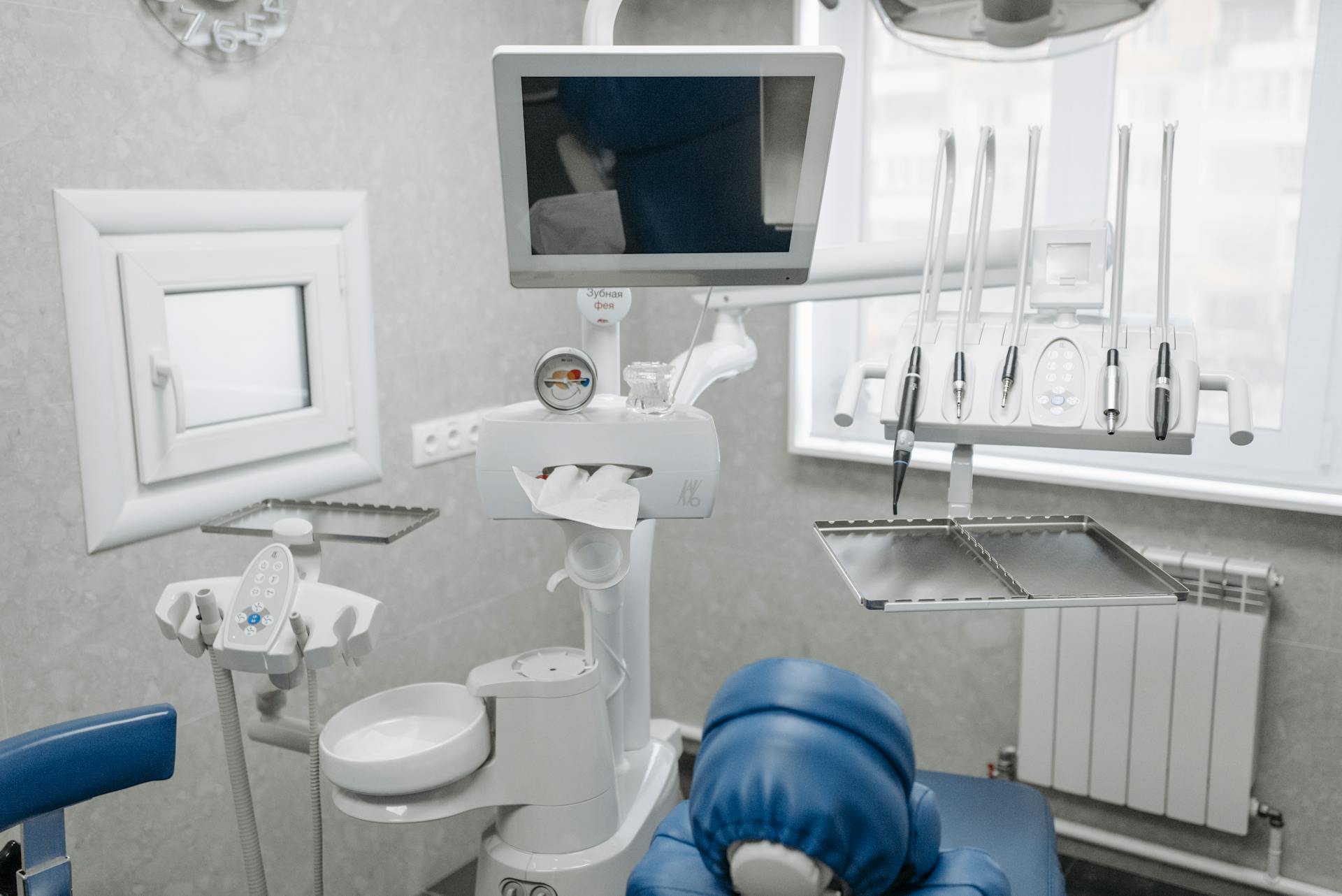 High-tech dental office setup with advanced dental instruments and a comfortable chair.