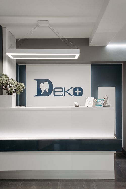 Free Clean and modern dental clinic reception area with minimalist design and stylish lighting. Stock Photo