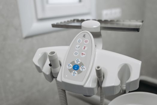 Close-up of advanced dental equipment in a clinic setting, showcasing technology.