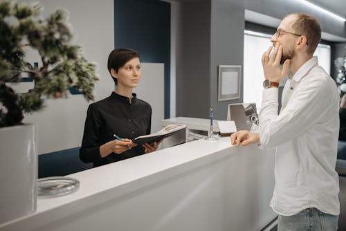 Patient with Toothache Scheduling Appointment with Receptionist