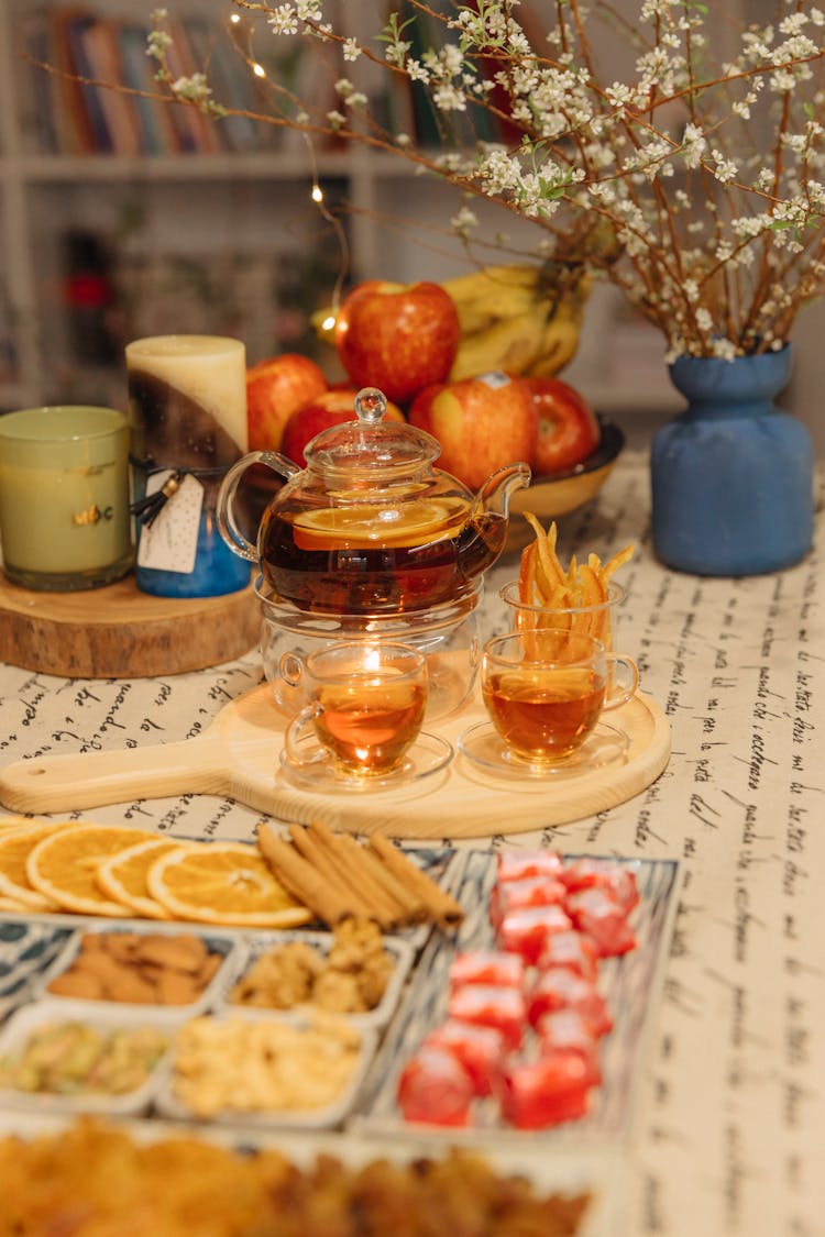 Tea In Glasses And A Tray Of Snacks On A Table 