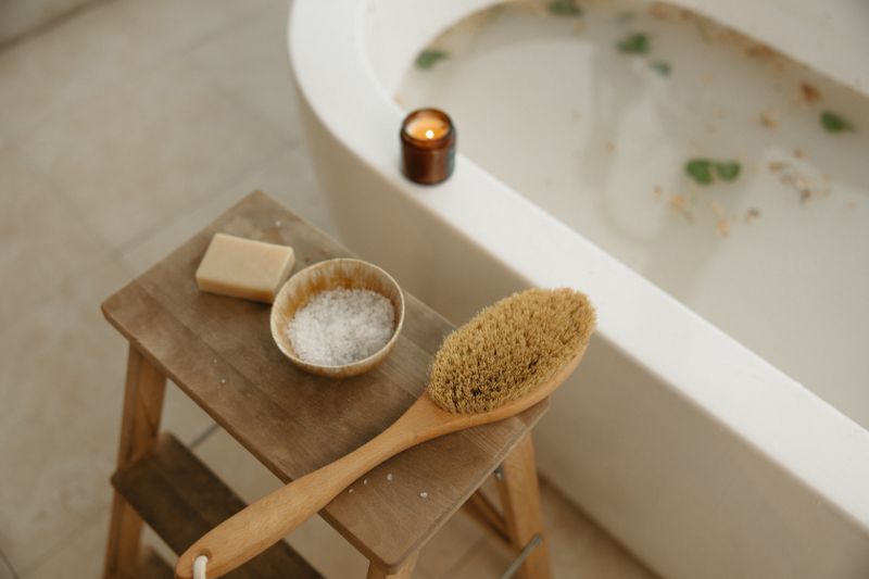 Relaxation bath scene with candle and sea salt