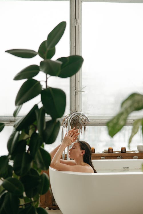 Free Photo of a Woman in the Bathtub Stock Photo
