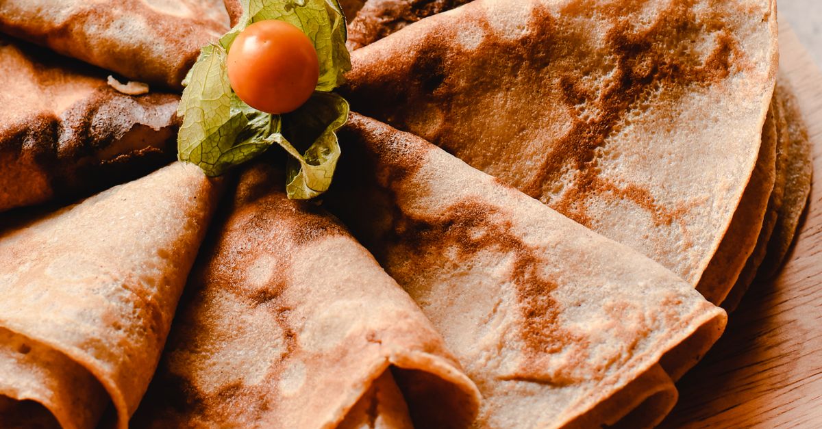 Crep Image Close Up Photo of Crepe on Wooden Board · Free Stock Photo