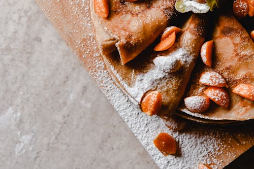 Pancakes with Cape Gooseberries in Powdered Sugar